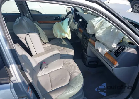 2002 Lincoln Continental из США, поврежденный, VIN 1LNHM97V32Y655654